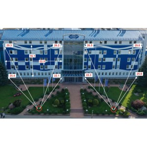 Освещение эмблемы предприятия Молочный мир на здании